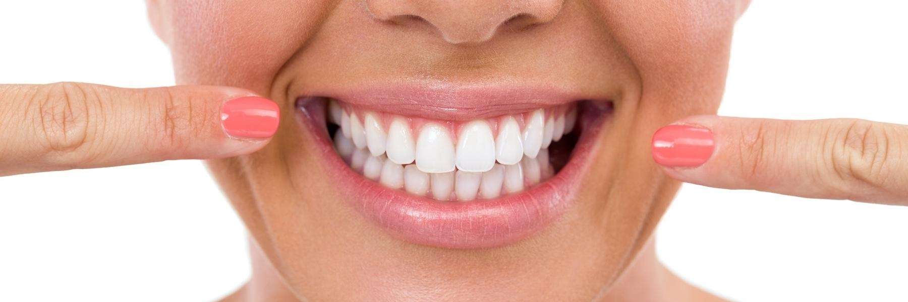 woman showing off her bright white smile in centennial