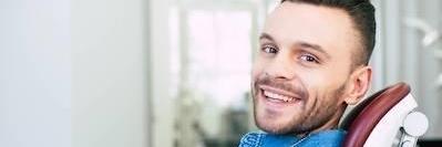 Man at the dentist | Root canals centennial CO