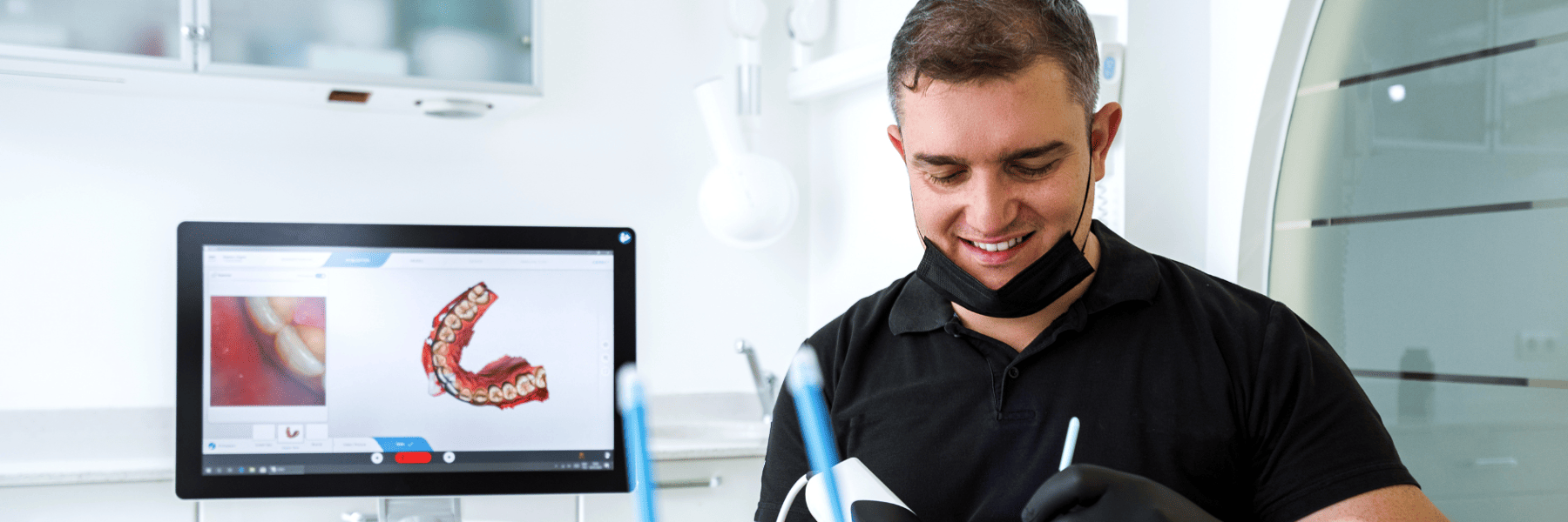 Man putting cerec crown into patients mouth, centennial colorado