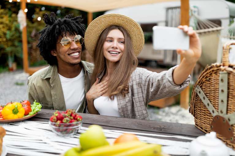 young couple taking a selfie in centennial co