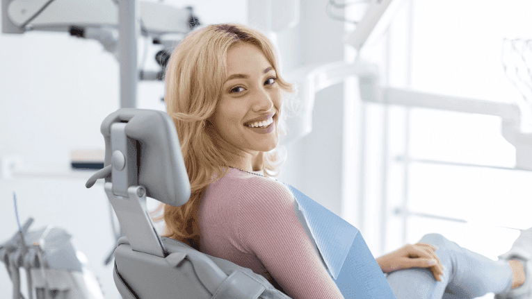 girl at her teeth whitening appointment in centennial