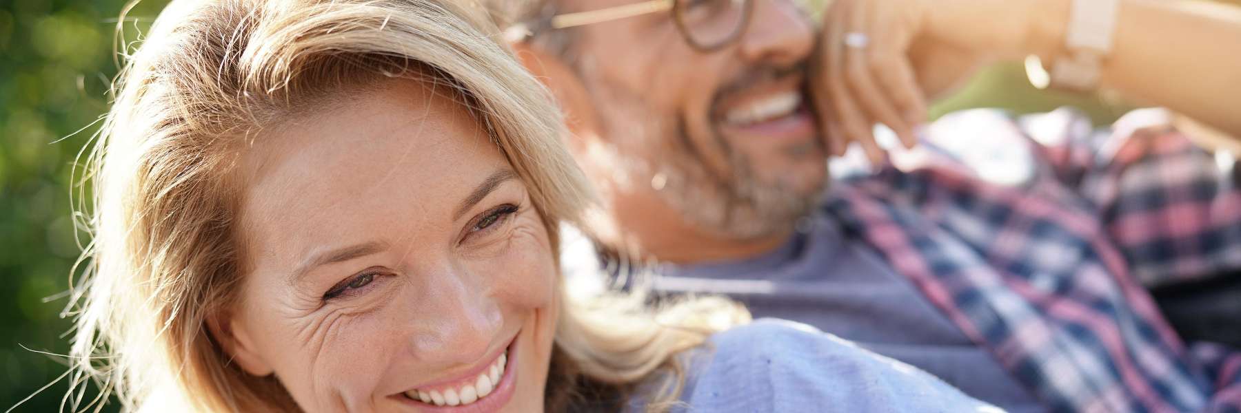 older couple in car smiling | smile makeovers centennial co