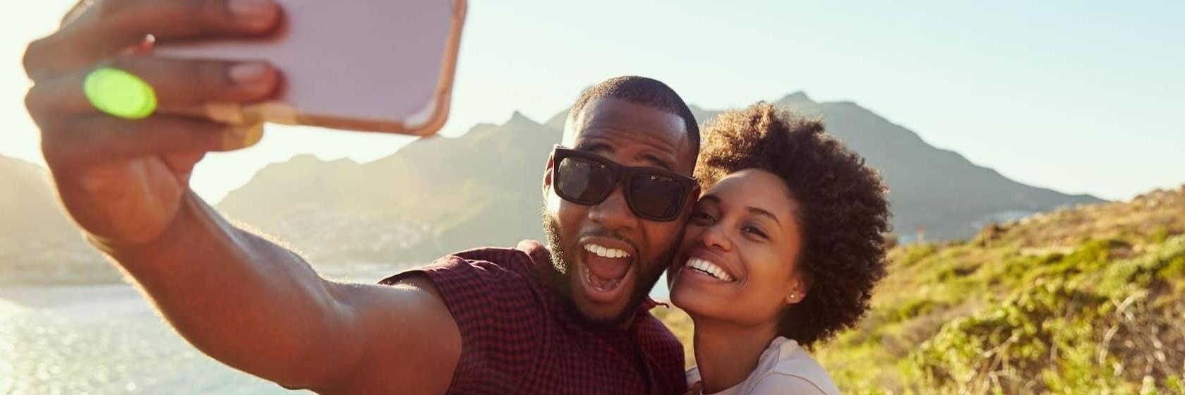 Centennial Teeth Whitening | Couple taking a selfie