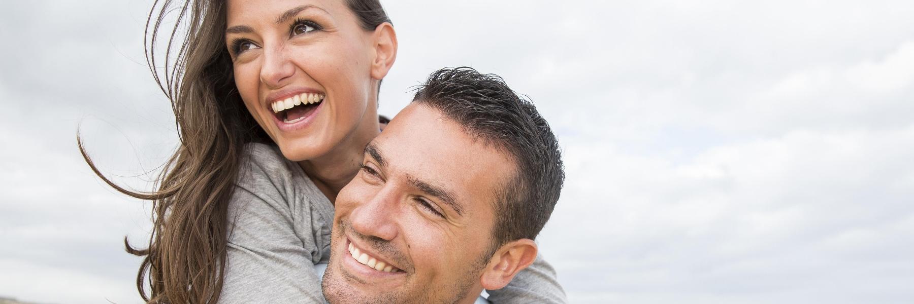Couple after gum disease treatment in greenwood village