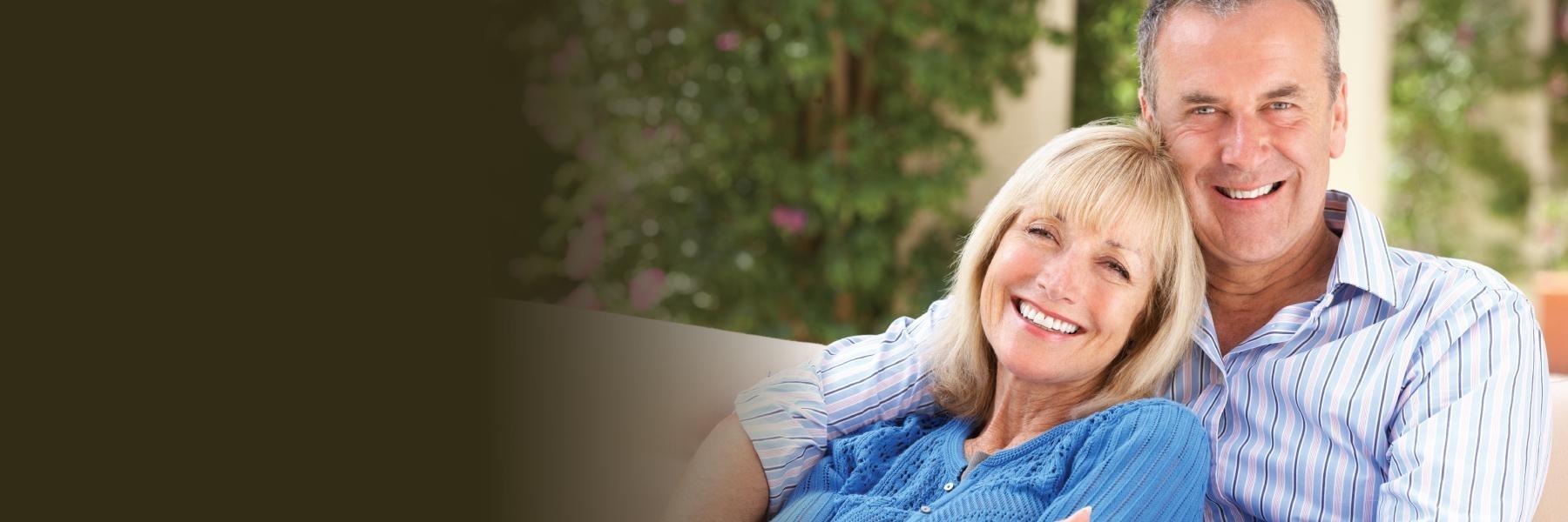 Couple on Couch | dental bridges Centennial