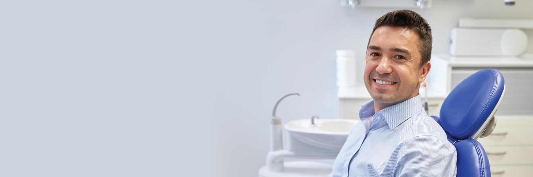 root canals centennial | Man at Dentist